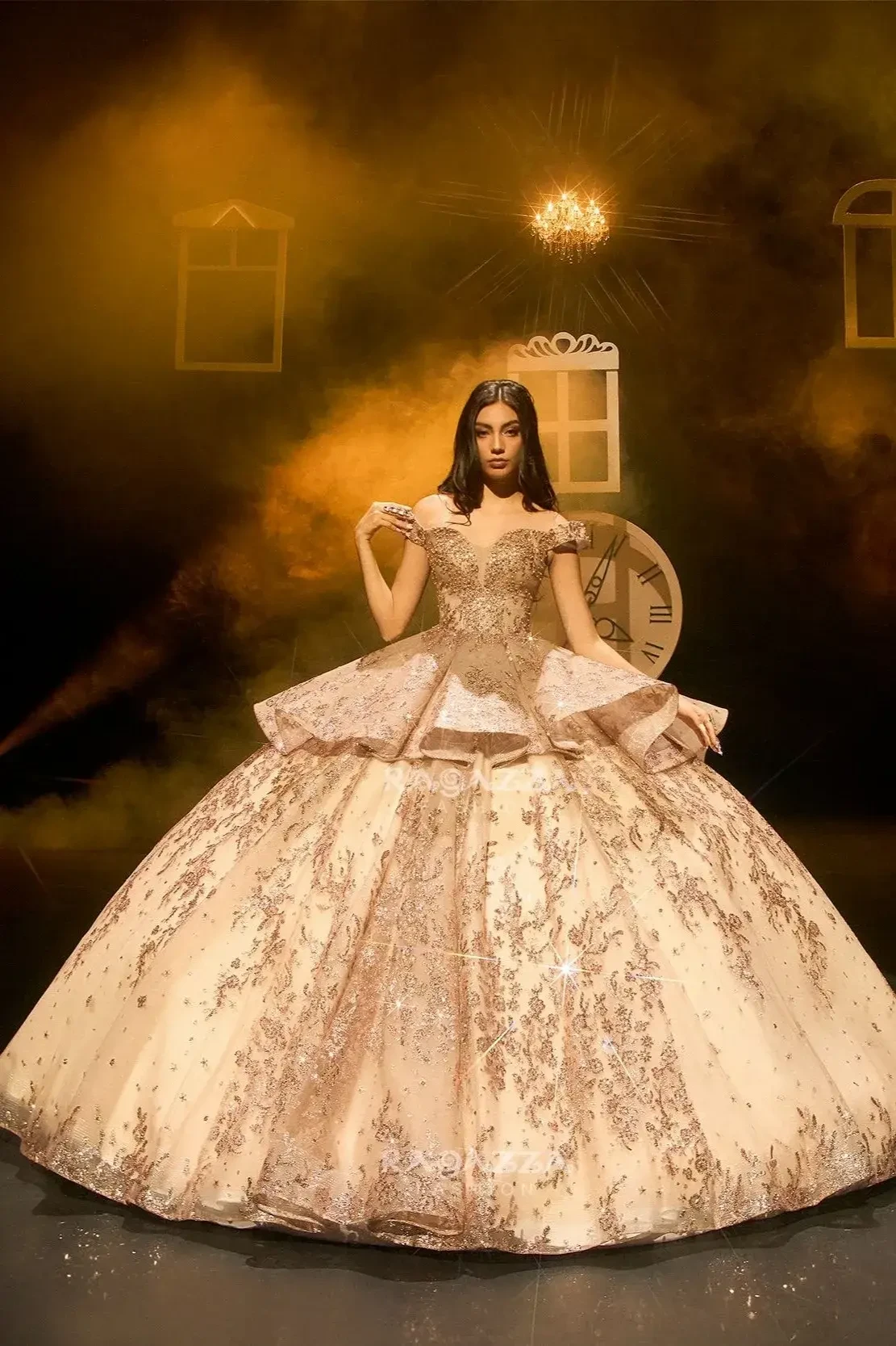 A woman in an opulent, gold embellished ball gown stands serenely against a smoky, mystical backdrop. The atmosphere is elegant and dramatic.